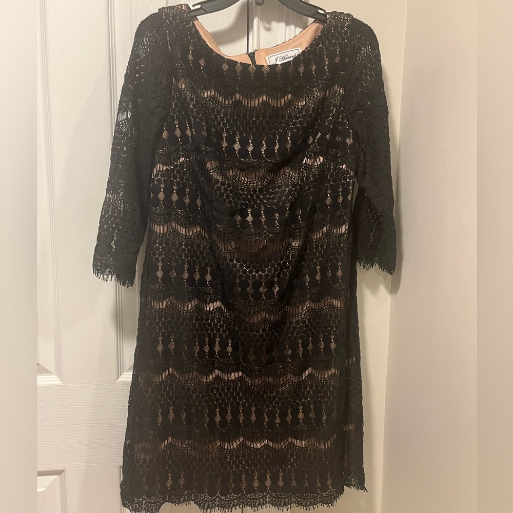 Black lace 1/4 sleeves fully lined in nude underneath. Very lightweight